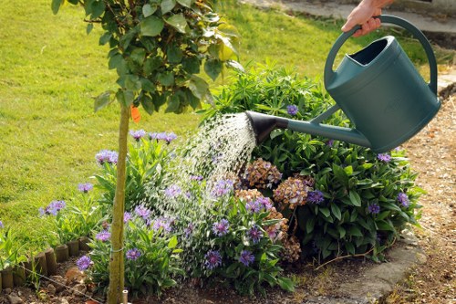 Gardener wearing protective equipment during maintenance